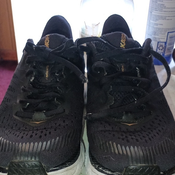 HOKA Black and Gold Running Shoes